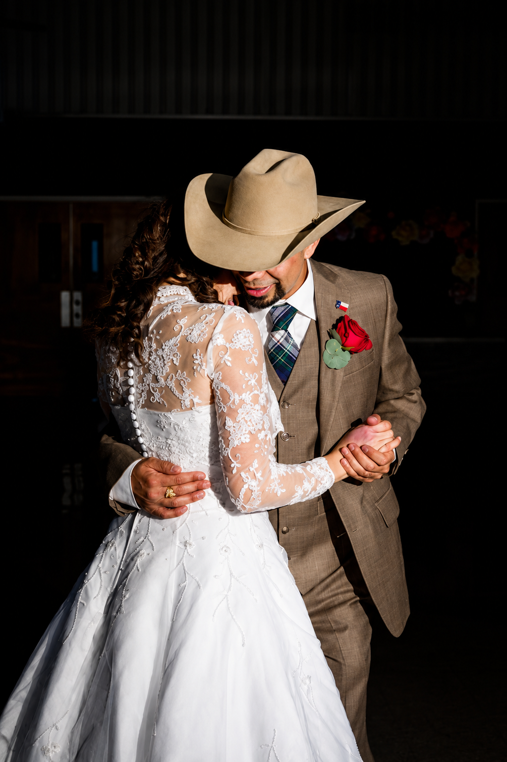 A couple's first dance at their wedding reception
