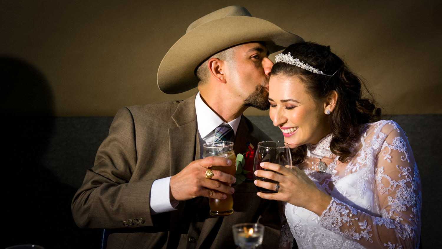 Jim and Anna sharing a toast at their wedding reception