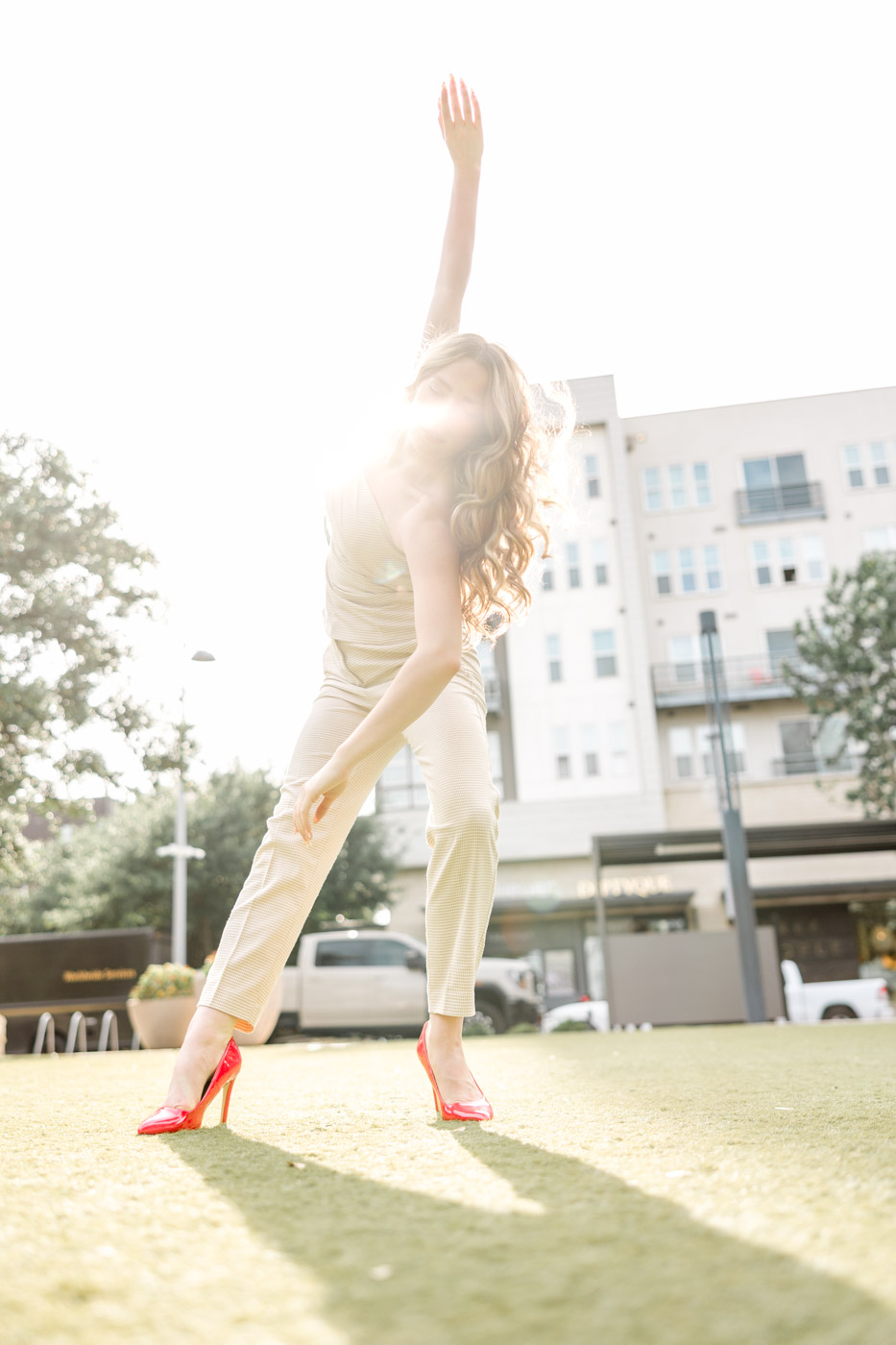 Brynley putting on her dancing shoes during her senior session
