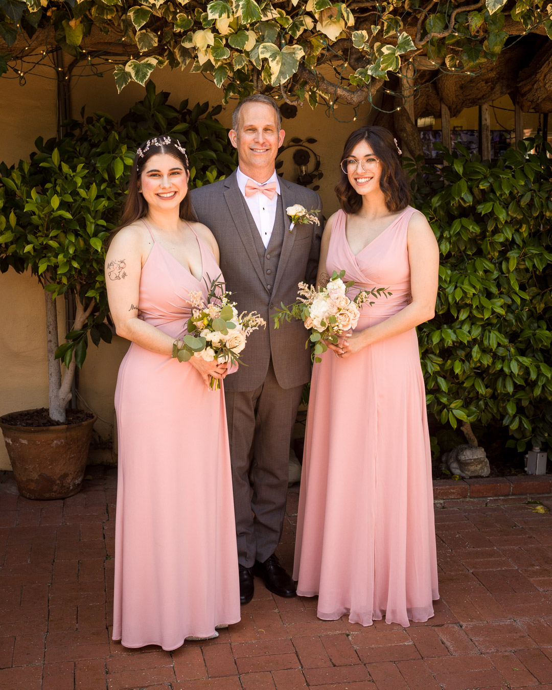 Couple portrait near the courtyard fountain