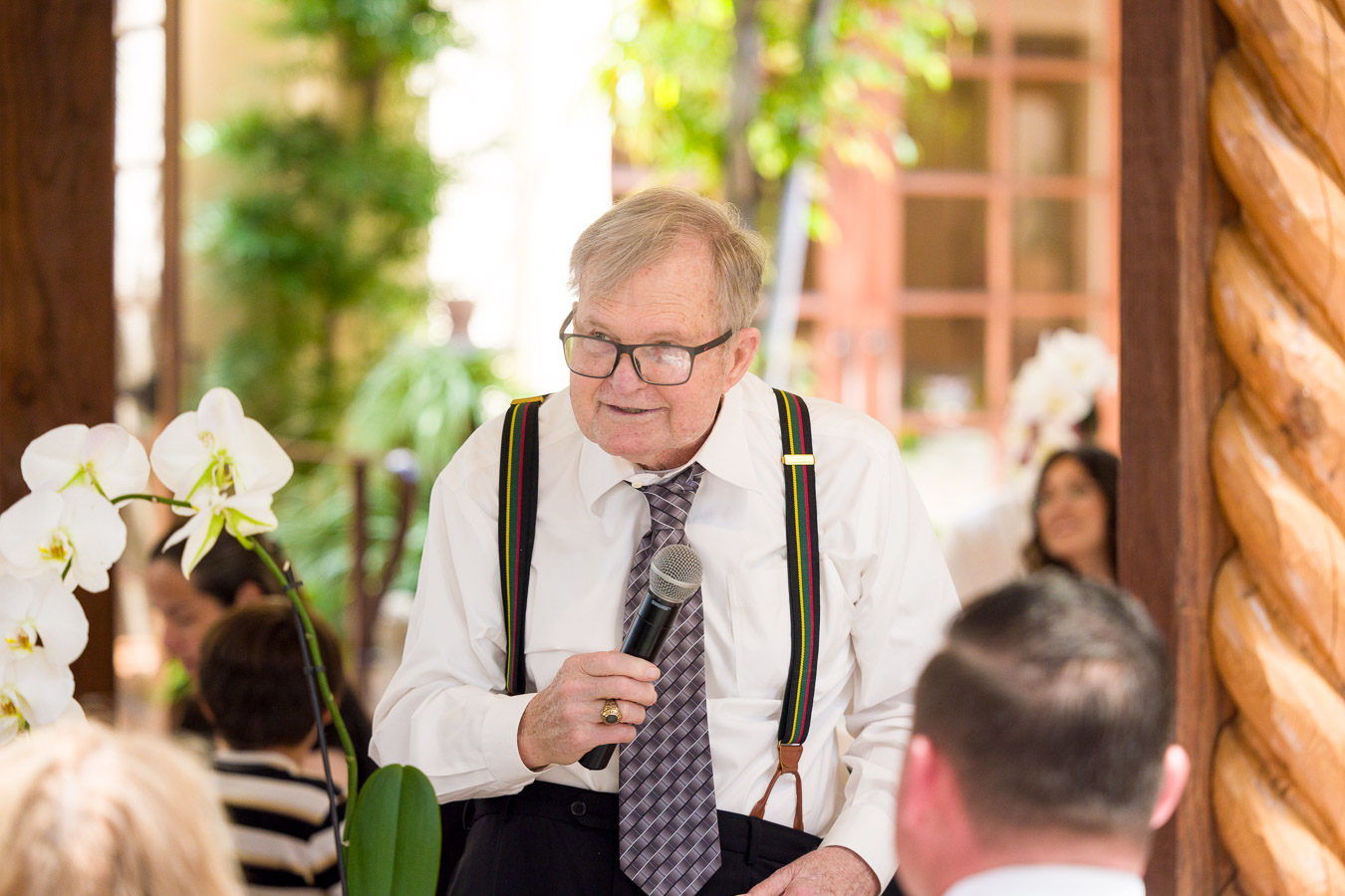 Jim and Anna sharing a toast at their wedding celebration