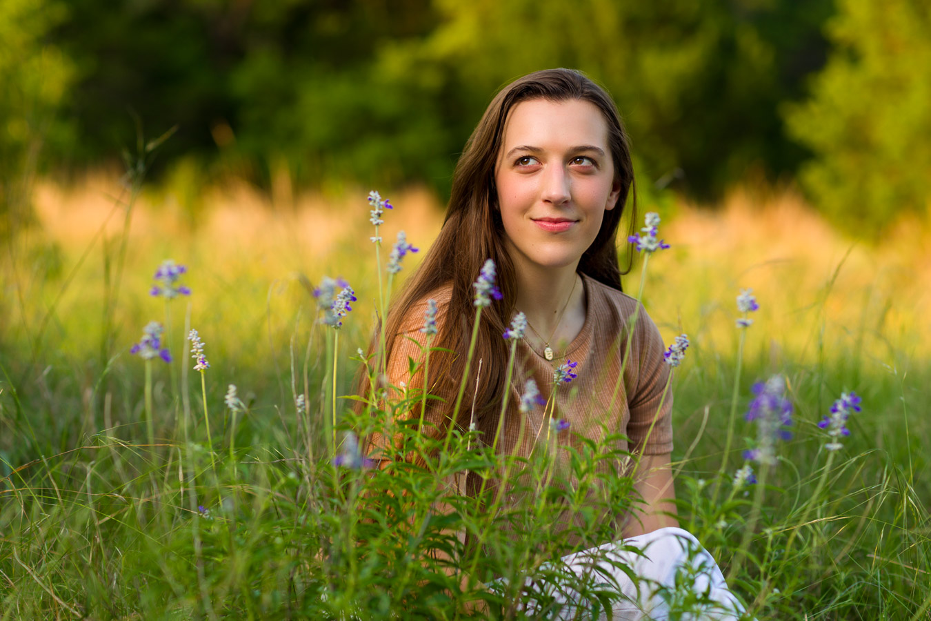 Senior portrait in wildflowers Austin