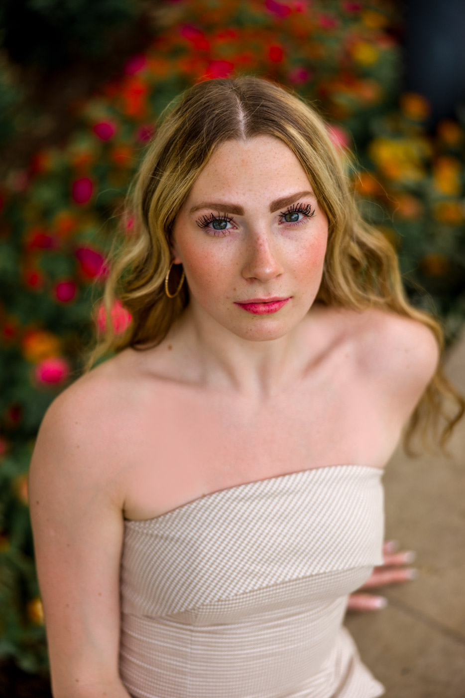 A senior's signature portrait, hair and makeup styled